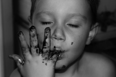 Close-up portrait of shirtless boy