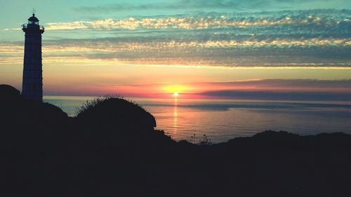 View of calm sea at sunset