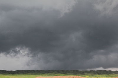 Storm clouds over land