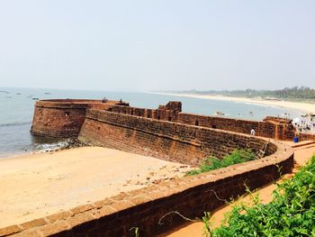 View of sea with buildings in background