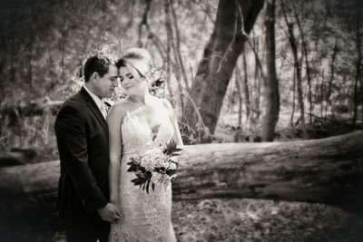 Couple standing in park