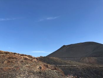 Scenic view of arid landscape against sky