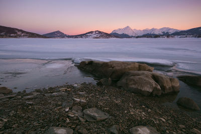 Scenic view of sea against sky during sunset