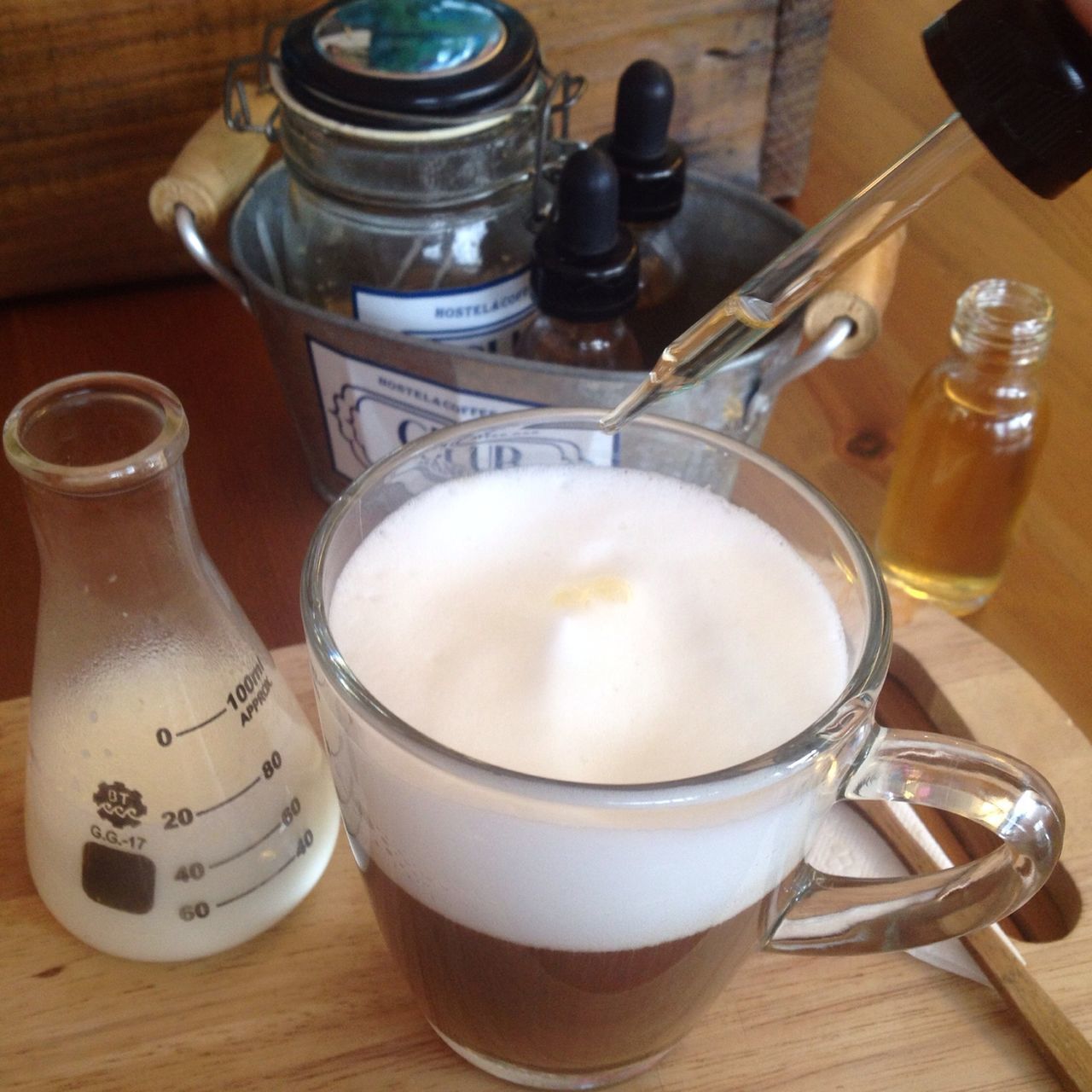 indoors, coffee cup, drink, food and drink, table, coffee - drink, refreshment, still life, saucer, cup, coffee, high angle view, freshness, tea cup, wood - material, spoon, close-up, frothy drink, no people, beverage