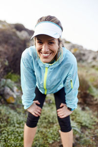 Tired woman resting after running