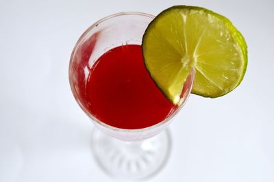 Close-up of red fruit on white background