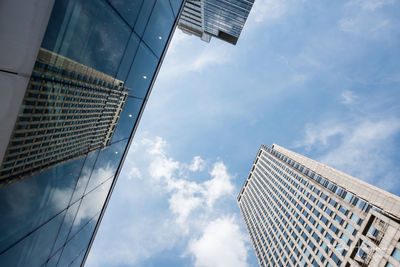 Low angle view of skyscrapers against sky