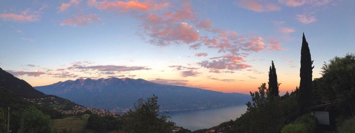 Scenic view of mountains against cloudy sky