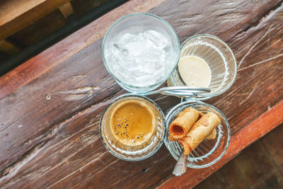 High angle view of glass jar on table