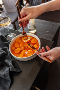 Midsection of man preparing food