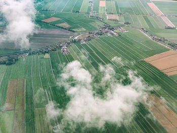 High angle view of river amidst agricultural landscape