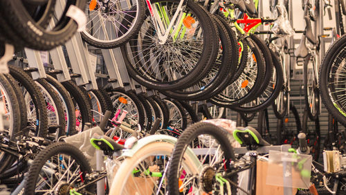 Close-up of bicycles for sale at store