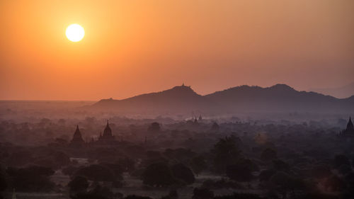 Sunrise over pagodas in bagan, myanmar.