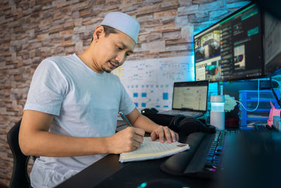 Man working on table