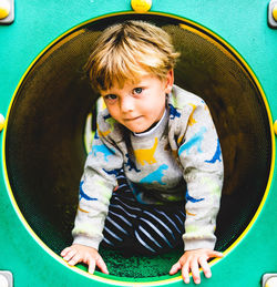 Portrait of boy playing outdoors