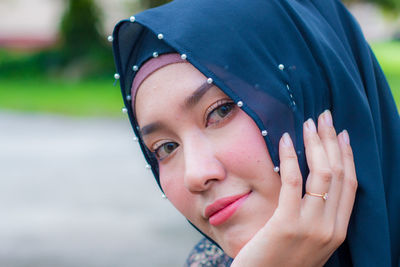 Close-up portrait of beautiful young woman