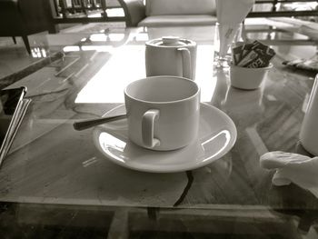 Close-up of coffee cup on table