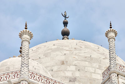 Low angle view of mosque against sky