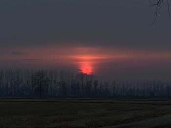 Scenic view of silhouette landscape against sky during sunset