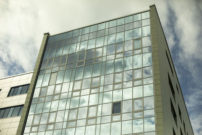 Low angle view of modern building against sky