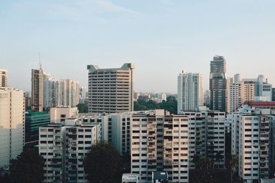 Modern buildings in city against sky