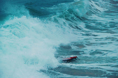 Man surfing in sea