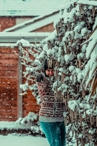 Girl standing in snow