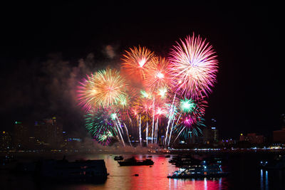 Firework display at night