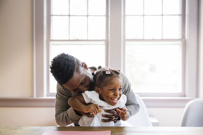 Mother and daughter at home