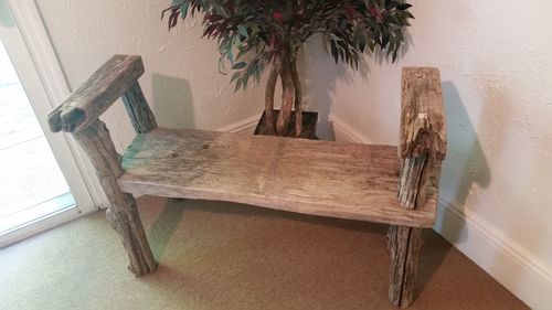 Close-up of chairs on table at home