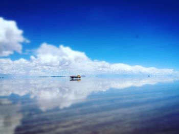 Scenic view of samar de uyuni with truck