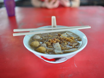 Close-up of noodles in bowl on table