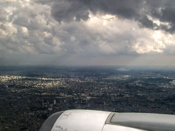 Aerial view of cityscape against sky