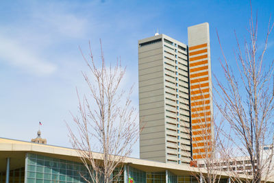 Low angle view of skyscraper against sky