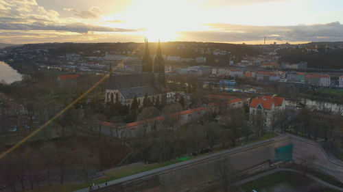 High angle shot of townscape against sky at sunset