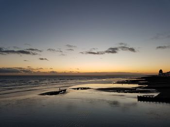 View of beach at sunset