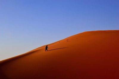 Scenic view of desert against clear sky