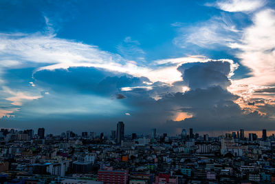 High angle view of buildings against sky during sunset