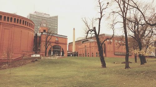 Built structure with trees in foreground