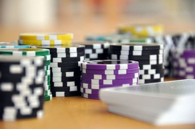 Close-up of gambling chips on table