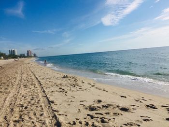 Scenic view of beach against sky