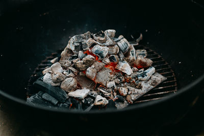 High angle view of fire on barbecue