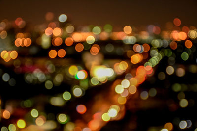 Defocused image of illuminated lights at night