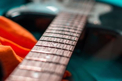 Close-up of playing guitar