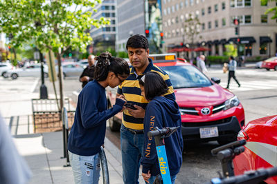 People on street in city