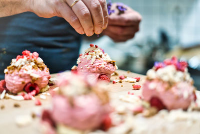 Close-up of hand holding ice cream