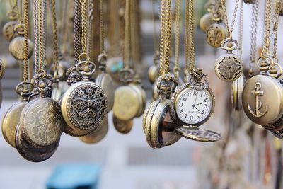 Close-up of pocket watches for sale