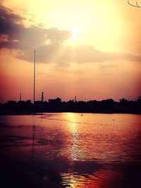 Scenic view of river during sunset