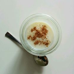 Close-up of coffee cup on white background