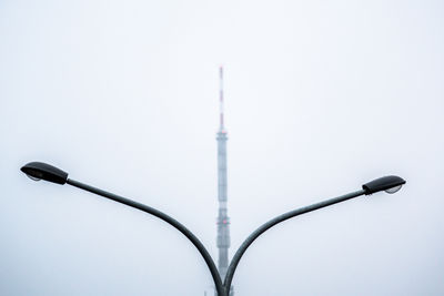 Low angle view of street light against clear sky